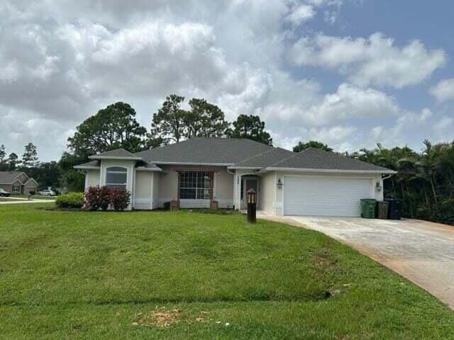 Property Photo:  102 NW Peach Street  FL 34983 