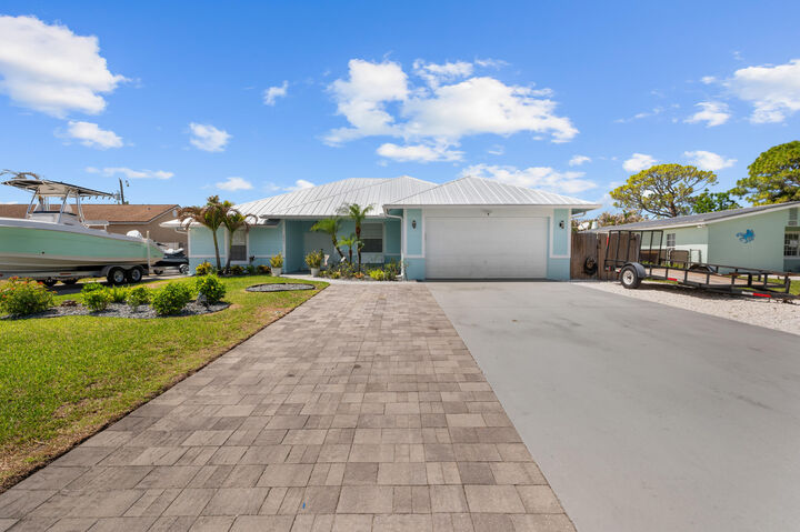 Property Photo:  6481 SE Clairmont Place  FL 33455 