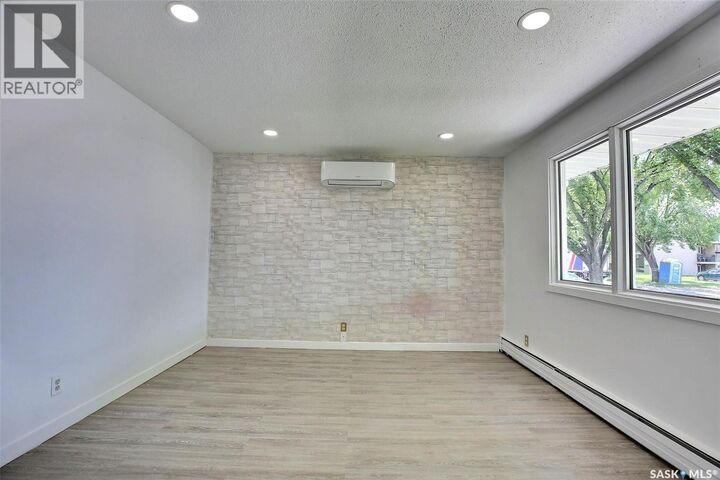 Property Photo: 243 Smith Street N SK S4R 3B5