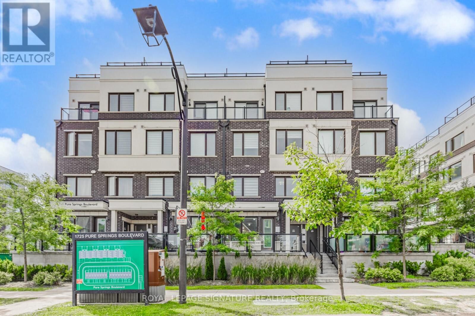 Property Photo:  1711 Pure Springs Boulevard 202  ON L1X 0E3 