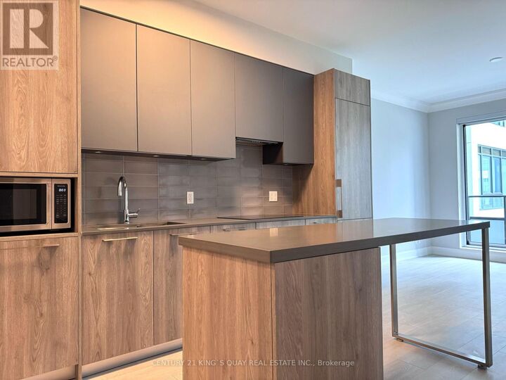 Property Photo: 38 Waterwalk Drive 331 ON L3R 6M8