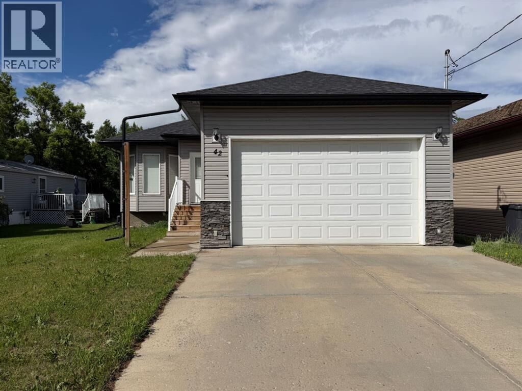 Property Photo: 42 Red Deer Avenue AB T0J 2E0
