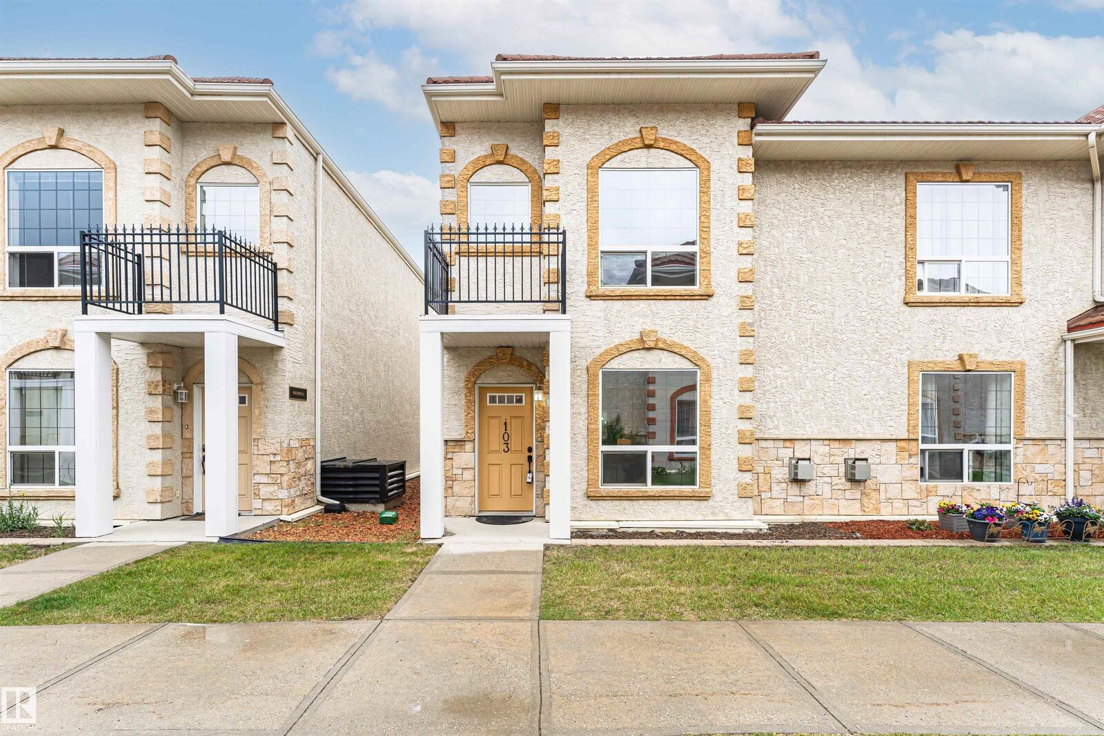 Property Photo: 13825 155 Avenue NW 103 AB T6V 0B8