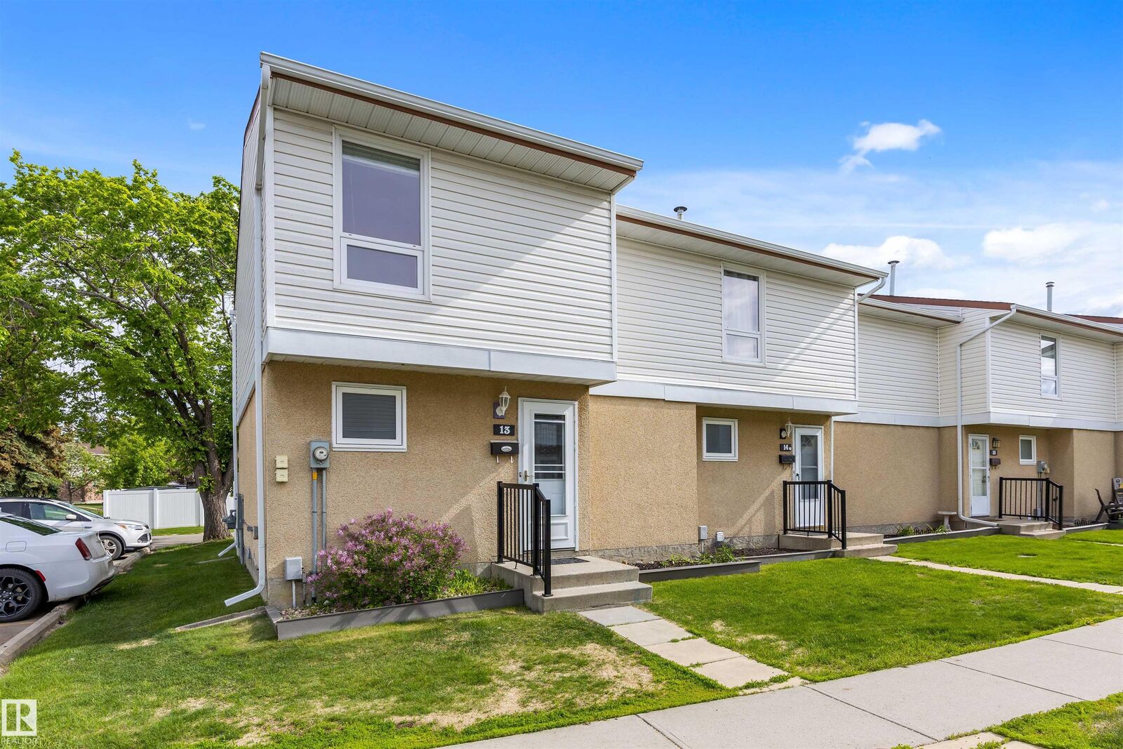 Property Photo: 9310 Morinville Drive 13 AB T8R 1J8