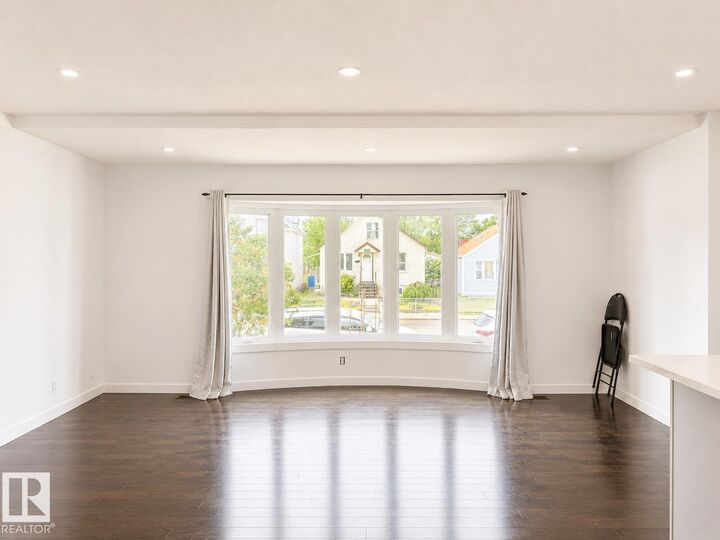 Property Photo:  11545 95 Street NW  AB T5G 1L5 