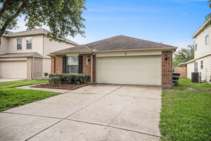 Property Photo: 9326 Garfield Park Lane TX 77075