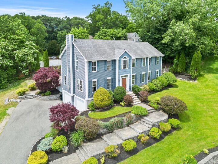 Property Photo:  8 Woods Hill Cir  MA 01801 