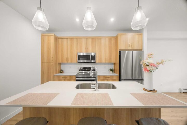 Property Photo:  55 Lucas Way NW 2104  AB T3P 2C7 
