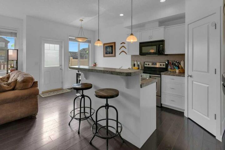 Property Photo: 413 River Avenue 402 AB T4C 0P2