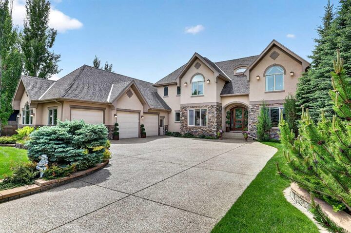 Property Photo: 128 Heritage Lake Drive AB T1S 4H7
