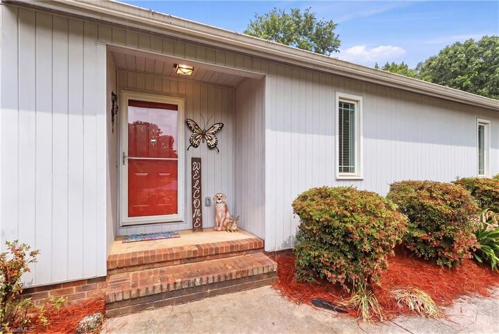 Property Photo: 7706 Moutline Court NC 27409
