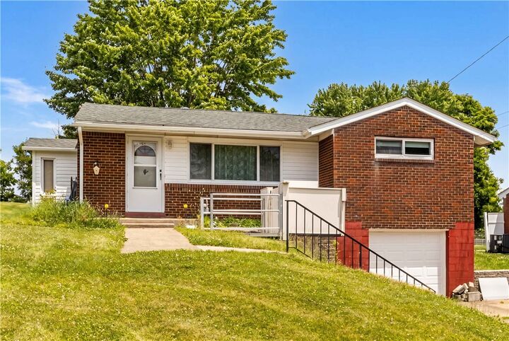 Property Photo: 203 Burch Dr PA 15108