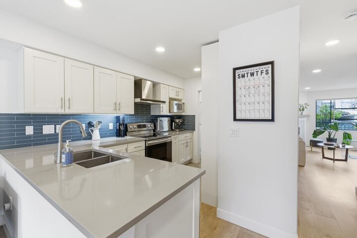 Property Photo: 2118 Eastern Avenue 10 BC V7L 3G3
