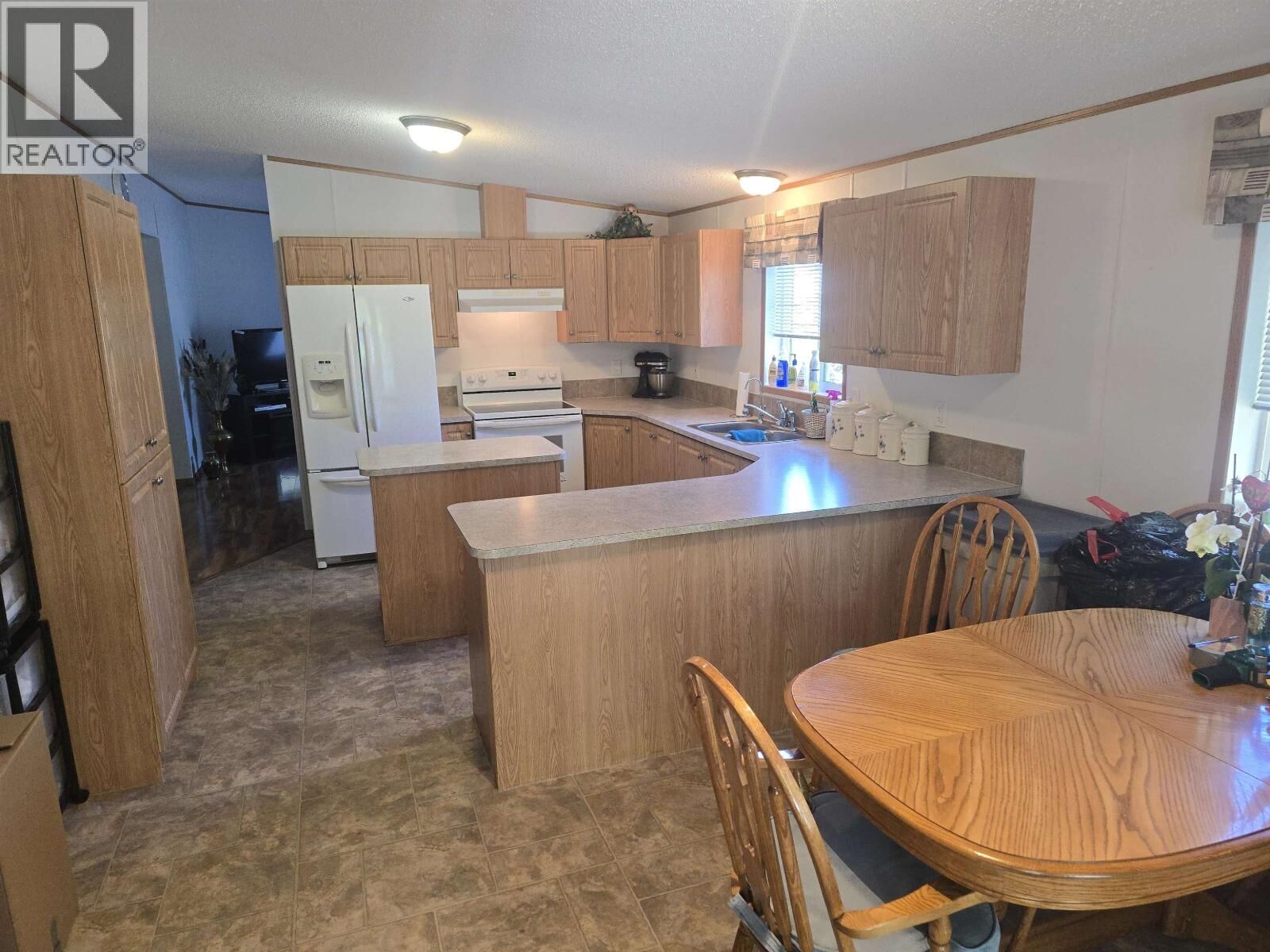 Photo de la propriété:  7100 Aldeen Road 54  BC V2N 5R5 