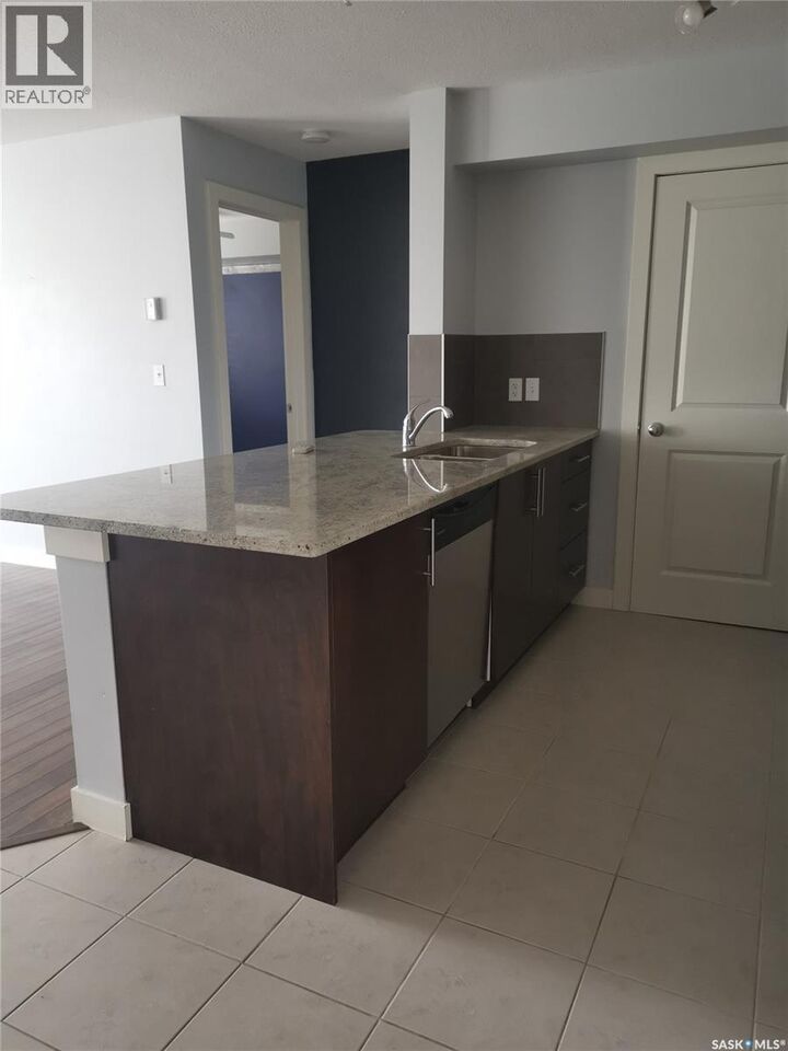 Property Photo: 104 306 Petterson Drive SK S4A 2A8