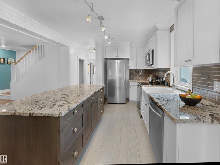 Property Photo:  7624 92 Avenue NW  AB T6C 1R4 