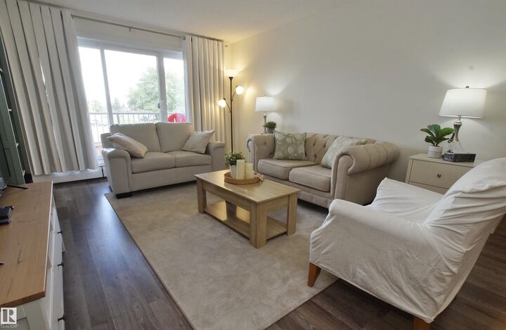 Property Photo: 4404 122 Street NW 235 AB T6H 4E2