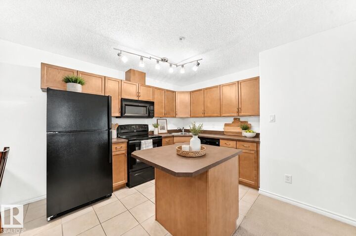 Property Photo: 16311 95 Street NW 134 AB T5Z 3Y5
