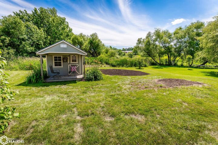 Property Photo:  1410 Greenfield Drive  IA 50158 