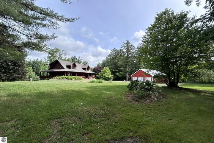 Property Photo:  8100 Hodge Road  MI 49649 
