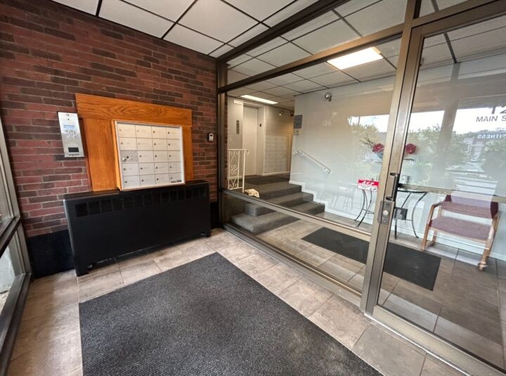 Property Photo:  122 Main Street 402  MA 02180 