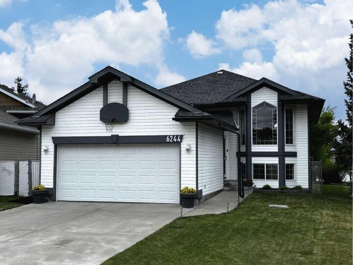 Property Photo: 6244 Cypress Close AB T4H 1M7