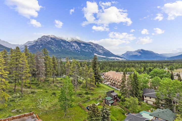 Property Photo:  254A Three Sisters Drive  AB T1W 2M7 