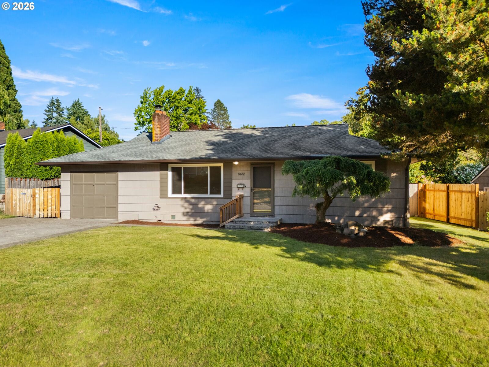 Property Photo:  6472 SW 46th Pl  OR 97221 