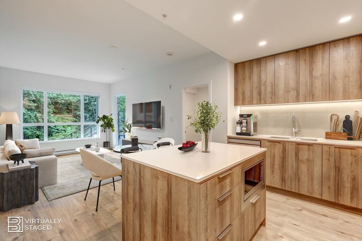 Property Photo: 3594 Malsum Drive 206 BC V7G 0B5