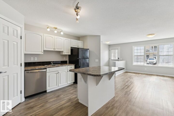 Property Photo: 150 Edwards Drive SW 52 AB T6X 1M4