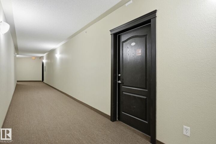Property Photo: 9363 Simpson Dr NW 1223 AB T6R 0N2
