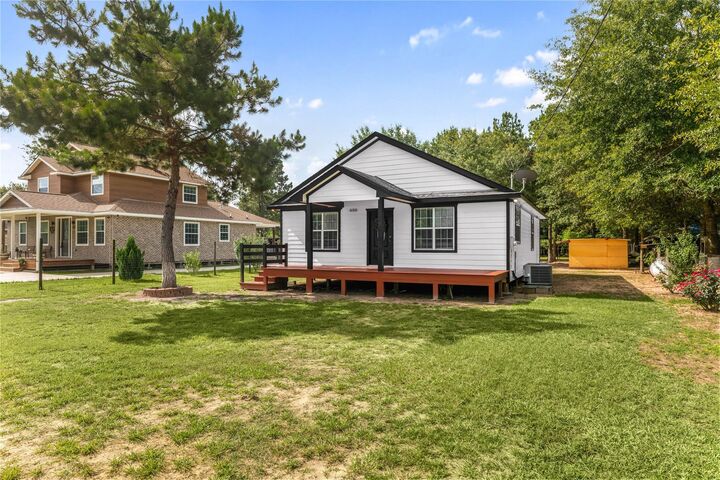 Property Photo:  650 County Road 3404  TX 77327 