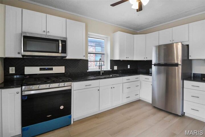 Property Photo:  7104 Tulane Avenue  MO 63130 