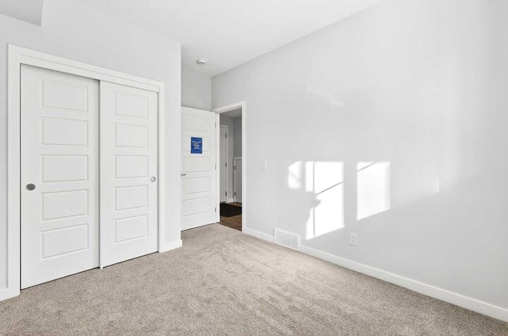 Property Photo: 28 Red Embers Plaza NE 105 AB T3N 2W1