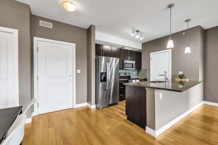 Property Photo:  11 Millrise Drive SW 407  AB T2Y 0K7 