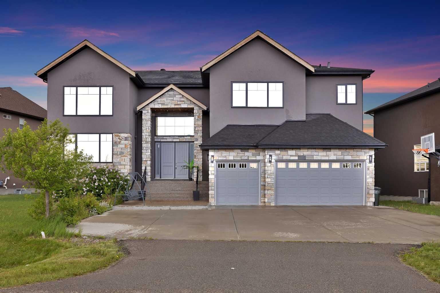 Property Photo: 126 Cambridge Park Way AB T1Z 0A2