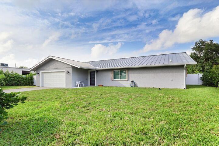 Property Photo: 615 NE 15th Place FL 33435