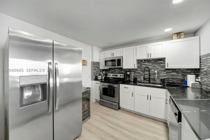 Property Photo:  427 Golden Isles Dr 16H  FL 33009 