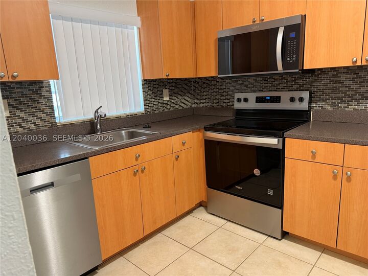 Property Photo:  4767 NW 9th Dr 4767  FL 33317 