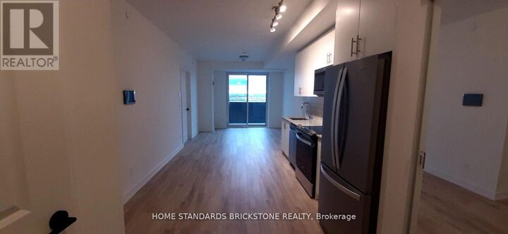 Property Photo: 335 Wheat Boom Drive 712 ON L6H 7Y1
