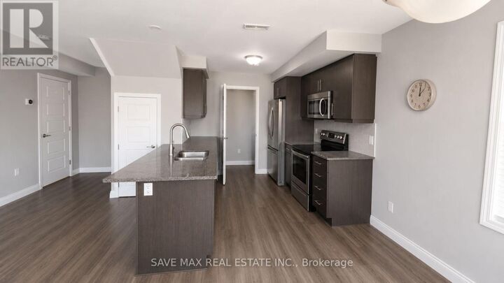 Property Photo:  4 Daylily Lane 12  ON N2R 0L7 