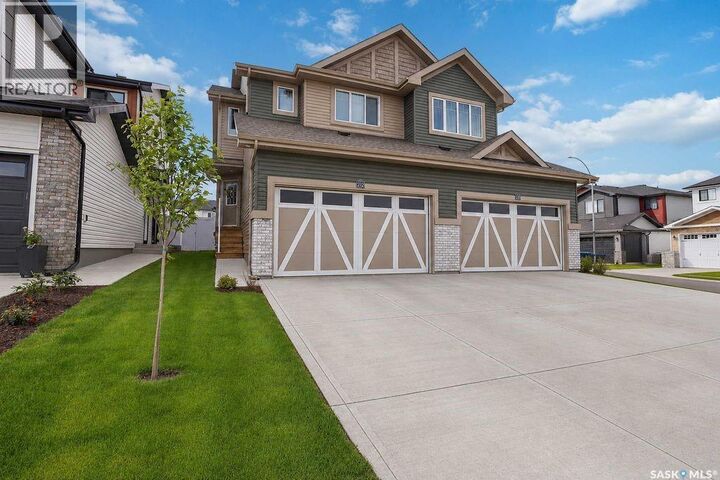 Property Photo: 212 Myles Heidt Lane SK S7W 1J1