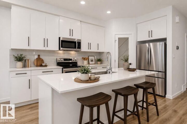 Property Photo:  7470 Klapstein Crescent SW  AB T6W 5N8 
