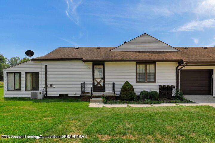 Property Photo:  508 Red Cedar Boulevard  MI 48895 