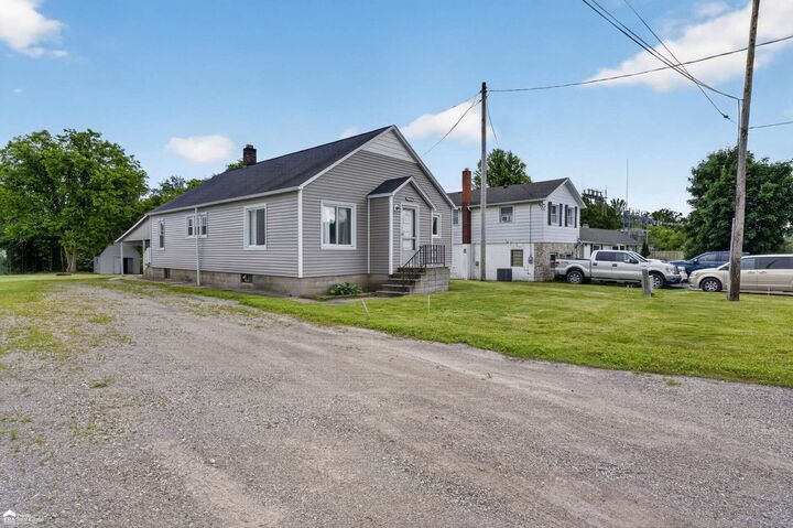 Property Photo:  7514 S Saginaw Street  MI 48460-9698 
