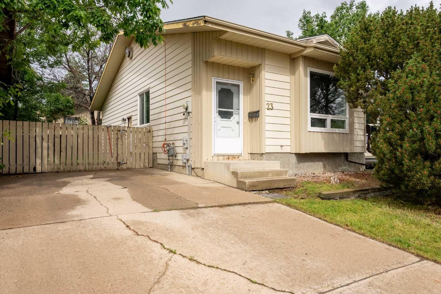 Property Photo:  23 Dakota Road W  AB T1K 5L4 