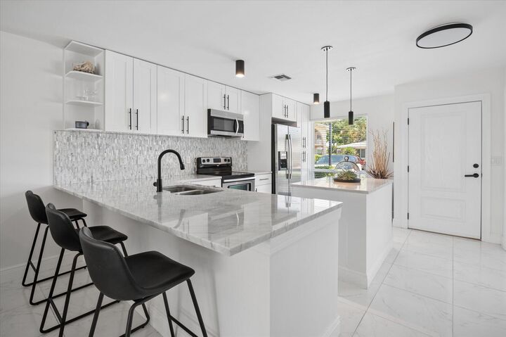 Property Photo:  13725 Flora Place C  FL 33484 