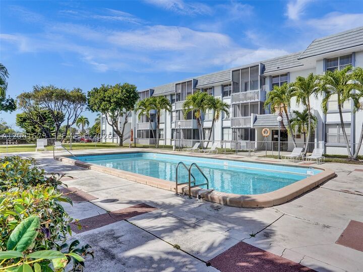 Property Photo:  6705 NW 169th St C112  FL 33015 