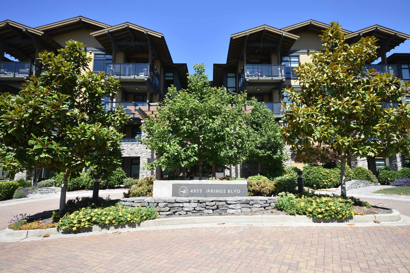 Property Photo: 4977 Springs Boulevard 409 BC V4M 0C1