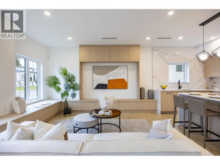 Property Photo:  7353 12th Avenue 4  BC V3N 2J8 
